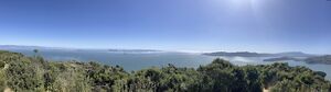 This is a panorama of the Bay taken from Mt. Livermore's summit on Angel Island. In the background, looking from the left are the East Bay, Treasure Island, the Bay Bridge, the city, the Golden Gate Bridge, the Marin headlands, Sausalito, and Tiburon.